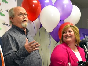 Powerball jackpot co-winners Lisa and John Robinson of Munford, Tennessee speak to the media at the headquarters of the Tennessee Lottery in Nashville, Tennessee January 15, 2016. A Tennessee couple holding one of three winning tickets for this week's record $1.6 billion U.S. Powerball lottery jackpot said on Friday they will keep their jobs because "you just can't sit down and do nothing."  REUTERS/Harrison McClary