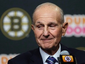 Boston Bruins owner Jeremy Jacobs listens to a reporter’s question during a news conference in Boston, Tuesday, May 20, 2014. (THE CANADIAN PRESS/AP/Charles Krupa)