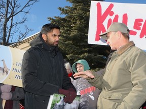 Dozens of protesters made some noise Saturday outside the Africa Show, an event that was moved last minute to the Premier Banquet Hall in Vaughan. Rather than avoid the Animal Rights Toronto demonstrators, Paul Peca waded into the crowd and did his best to defend trophy hunting. CHRIS DOUCETTE/TORONTO SUN