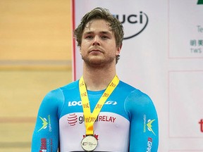 Canadian track cyclist Hugo Barrette with his silver medal after the men’s keirin race at the UCI track cycling World Cup in Hong Kong. (Cycling Canada)