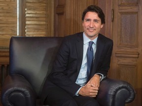 Prime Minister Justin Trudeau waits for media to leave the room before starting a meeting with Nova Scotia Premier Stephen McNeil at the start of a meeting on Parliament Hill in Ottawa, Wednesday January 13, 2016. THE CANADIAN PRESS/Adrian Wyld