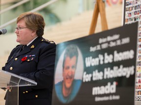 Marianne Ryan, commanding officer RCMP 'K' Division, speaks about her sister who was lost to a drunk driver, during MADD Edmonton's launch of the annual Red Ribbon Campaign at City Hall in Edmonton, Alta., on Friday November 6, 2015. The organization encourages drivers to tie a red ribbon to their vehicle to show their commitment to drive safe and sober and to show their respect for those injured and killed by impaired drivers. Ian Kucerak/Edmonton Sun/Postmedia Network