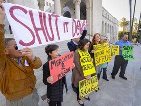 Residents and supporters stand outside Los Angeles City Hall during a demonstration ahead of the testimony before the Los Angeles City Council on the ongoing natural gas leak in the Porter Ranch area of Los Angeles, California December 1, 2015. Government and industry officials in Ontario say it's unlikely a similar event would happen in the province. (REUTERS/Gus Ruelas)