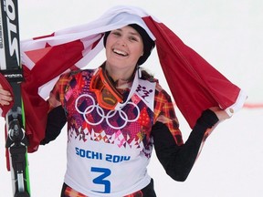 Canada's gold medallist Marielle Thompson celebrates her win following the women's ski cross final at the Sochi Winter Olympics in Krasnaya Polyana, Russia on Feb. 21, 2014. (THE CANADIAN PRESS/Jonathan Hayward)