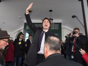Prime Minister Justin Trudeau waves to supporters as he arrives for a cabinet retreat at the Algonquin Resort in St. Andrews, N.B. on Sunday, Jan. 17, 2016. The federal Liberals will work on their plans for the year including their upcoming budget. THE CANADIAN PRESS/Andrew Vaughan