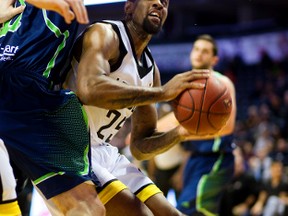 Akeem Wright a new player for the London Lightning looks for space to go to the hoop while being guarded by Logan Stutz of the Niagara River Lions at Budweiser Gardens in London, Ont. on Thursday January 14, 2016. (MIKE HENSEN, The London Free Press)