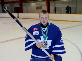 Toronto Marlboros goalie Josh Branton shows off a replica Silver Stick after his team won the atom 'AAA' championship of the Sarnia international finals at Clearwater Arena on Sunday, Jan. 17, 2016 in Sarnia, Ont. Toronto defeated Anaheim 8-1 in the final, one of six championships contested as the 47th annual tournament concluded. (Terry Bridge, Sarnia Observer)