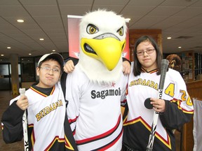 Sudbury Star file photo
Christian Toulouse, 11, left, and Kyla Toulouse, 13, meet the Little Native Hockey League tournament mascot at Tom Davies Square in 2012.