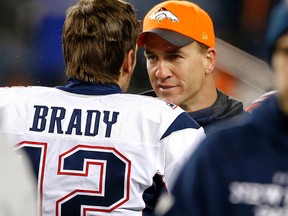 New England Patriots quarterback Tom Brady greets Denver Broncos quarterback Peyton Manning prior to an NFL football game in Denver on Nov. 29, 2015. (AP Photo/Joe Mahoney)