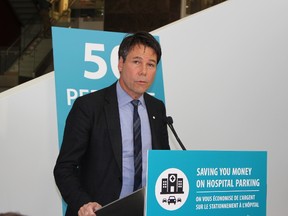 Ontario Health Minister Dr. Eric Hoskins was at Women's College Hospital in Toronto on Jan. 18 2016 to announce new rules to help lower the cost of hospital parking fees. (Antonella Artuso/Toronto Sun)