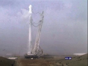 In an image provided by NASA TV, Space-X’s Falcon 9 rocket with the Jason-3 satellite aboard is shown less than four minutes from launch at Vandenberg Air Force Base, Calif., on Jan. 17, 2016. (NASA TV via AP)