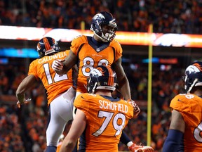 Denver Broncos wide receiver Demaryius Thomas celebrates with teammates after scoring on a two-point conversion against the Pittsburgh Steelers during the fourth quarter of the AFC Divisional round playoff game at Sports Authority Field at Mile High. (Matthew Emmons/USA TODAY Sports)