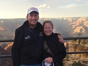 Image of Jim and Peggy Reid hiking the red canyon.(Supplied)