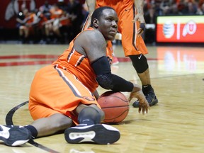Oregon State forward Jarmal Reid looks for eye contact with the referee after falling to the floor in the second half of an NCAA college basketball game against Utah in Salt Lake on Jan. 17, 2016. (AP Photo/Rick Bowmer)