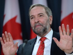 NDP Leader Tom Mulcair holds a press conference at the National Press Theatre in Ottawa on Monday, Jan 18, 2016, before leaving for Montebello, Quebec, where the NDP Caucus will hold a strategy meeting ahead of the return of Parliament on Jan 25, 2016. THE CANADIAN PRESS/Sean Kilpatrick