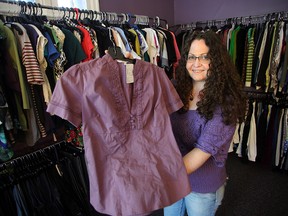 Michelle Pennock, one of the directors of the Purple Cactus Thrift Boutique, is seen in her shop Jan. 18, 2016. The shop sells donated clothing to help people recovering from addictions.