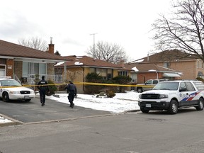Toronto Police at the scene on Otonabee Ave. Sunday, Jan. 17, 2016 after a woman was found dead. (Pascal Marchand photo)