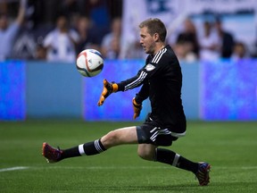 Colorado Rapids goalkeeper Clint Irwin allows a goal to the Vancouver Whitecaps during the second half of an MLS soccer game in Vancouver on Sept. 9, 2015. (THE CANADIAN PRESS/Darryl Dyck)