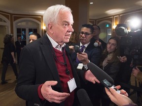 Immigration Minister John McCallum talks with reporters before a morning session at a cabinet retreat at the Algonquin Resort in St. Andrews, N.B. on Monday, Jan. 18, 2016. (THE CANADIAN PRESS/Andrew Vaughan)