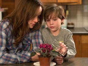 In this image released by A24 Films,  Brie Larson, left, and Jacob Tremblay appear in a scene from the film, "Room." Larson was nominated for an Oscar for best actress on Thursday, Jan. 14, 2016, for her role in the film. The 88th annual Academy Awards will take place on Sunday, Feb. 28,, at the Dolby Theatre in Los Angeles.  (A24 Films)