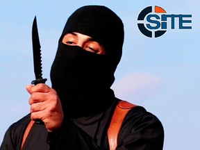 This image made from militant video, which has been verified by SITE Intel Group and is consistent with other AP reporting, shows Mohammed Emwazi , known as "Jihadi John," holding a knife. SITE is now reporting that he is dead. (SITE Intel Group via AP)