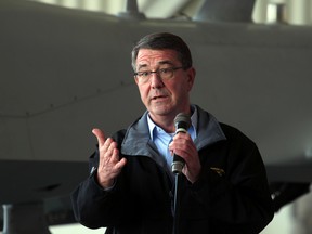 U. S. Defense Secretary Ash Carter, seen in this Dec. 15, 2015 file photo, is one of several military leaders to meet in Paris on Wednesday to examine ways to accelerate gains against Islamic State. (AP Photo)