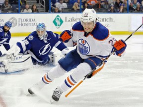 Edmonton Oilers center Leon Draisaitl (29), of Germany, celebrates after scoring past Tampa Bay Lightning goalie Andrei Vasilevskiy (88), of Russia, during the third period of an NHL hockey game Tuesday, Jan. 19, 2016, in Tampa, Fla. The Lightning won the game 6-4. (AP Photo/Chris O'Meara)