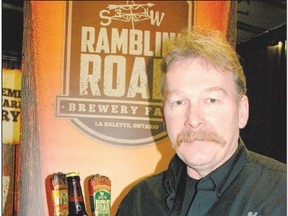 John Picard shows off Unleashed, the new IPA from Ramblin? Road Brewery Farm. (Wayne Newton, Special to Postmedia News)