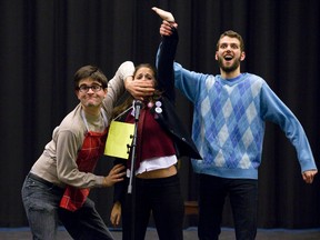 Spelling bee competitor Logainne Schwartzandgrubenierre, played by Sammy Koladich, is directed by her dads, Dan Dad, played by Matt Butler, and Carl Dad, played by Sam Boer, in a scene from King?s College Players? production of The 25th Annual Putnam County Spelling Bee at the Joanne and Peter Kenny Theatre at King?s University College. (CRAIG GLOVER, The London Free Press)