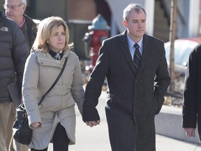 Dennis Oland and his wife Lisa head to the Law Courts where he was found guilty of second degree murder in the death of his father, Richard Oland, in Saint John, N.B. on Dec. 19, 2015. (THE CANADIAN PRESS/Andrew Vaughan)