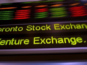 The TSX ticker is shown in Toronto on May 10, 2013. (THE CANADIAN PRESS/Frank Gunn)