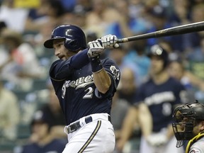 Jonathan Lucroy of the Milwaukee Brewers hits against the Pittsburgh Pirates at Miller Park on September 01, 2015 in Milwaukee. (Mike McGinnis/Getty Images/AFP)