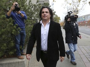 Sen. Patrick Brazeau leaves the courthouse after receiving an absolute discharge in his assault and cocaine possession trial in Gatineau, Que. October 28, 2015. (REUTERS/Chris Wattie)