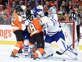 Toronto Maple Leafs goalie James Reimer (34) battles against Philadelphia Flyers right wing Pierre-Edouard Bellemare (78) during the second period at Wells Fargo Center Jan 19, 2016 in Philadelphia. (Eric Hartline-USA TODAY Sports)
