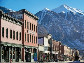 This undated photo provided by Telluride Ski Resort shows a streetscape in Telluride, Colo. Skiers like the area's wide open slopes, stunning views of the San Juan Mountains, and the lack of crowds, but visitors also cite the charms of its downtown, including local history and a walkable scale.  (Melissa Plantz/Telluride Ski Resort via AP)