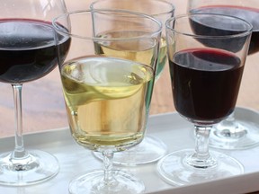 This Jan. 18, 2016 photo shows an assortment of red and white wine in Concord, N.H. Aiming for a new and improved you in 2016? That’s tough. Improving your wine experience? That’s not hard at all. Because if you want to drink better wine, the first step is drinking wine better.  (AP Photo/Matthew Mead)