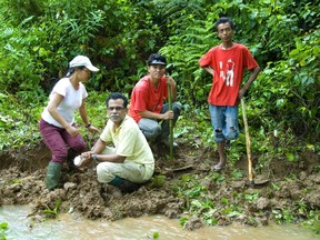 Indian scientist Sathyabhama Das Biju and R.G Kamei with their team during field work at an undisclosed location in north-eastern India. (AFP PHOTO/WWW.FROGINDIA.ORG/Sathyabhama Das Biju/HO)