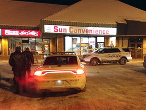 Kingston Police attend the scene of a robbery at the Sun Convenience store at 900 Montreal Street which occurred around 7 p.m. on Monday January 18 2016. The lone male suspect got away with an undisclosed amount of cash. Paul Schliesmann /The Kingston Whig-Standard/Postmedia Network