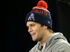 New England Patriots quarterback Tom Brady faces reporters before an NFL football practice, Wednesday, Jan. 20, 2016, in Foxborough, Mass. The Patriots are to play the Denver Broncos in the AFC Championship on Sunday in Denver. (AP Photo/Steven Senne)