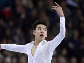 Nam Nguyen, of Canada, skates in the men's free skating event at Skate Canada International in Lethbridge, Alta., on Oct. 31, 2015. It hasn't been an easy season for Nam Nguyen. He's going through another growth spurt that has thrown his skating slightly off-kilter. He's feeling the pressure of defending his Canadian title against a field that once again includes Patrick Chan. THE CANADIAN PRESS/Jonathan Hayward