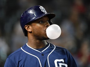 Justin Upton of the San Diego Padres blows a bubble while in the on deck circle during a game against the Arizona Diamondbacks at Chase Field on September 14, 2015 in Phoenix. (Norm Hall/Getty Images/AFP)