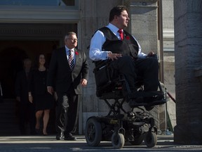 Minister of Veterans Affairs Kent Hehr, right. (THE CANADIAN PRESS/Sean Kilpatrick)
