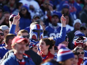 A Buffalo Bills fan cheers for his team against the Miami Dolphins during the first half at Ralph Wilson Stadium in Orchard Park, N.Y., on Nov. 8, 2015. (Brett Carlsen/Getty Images/AFP)