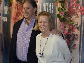 Former Abba member Anni-Frid Lyngstad arrives with Henry Smith at the premiere of "Mamma Mia! The Party" at Tyrol restaurant in Stockholm, Sweden, January 20, 2016. REUTERS/Anders Wiklund/TT News Agency