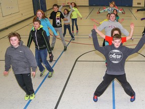 Tim Miller/The Intelligencer
The Grade 5/6 class of Jason Lloyd at Deseronto Public School perform jumping jacks on Wednesday. Jumping jacks are just one portion of a fitness challenge intended to get other youth involved in physical activity.