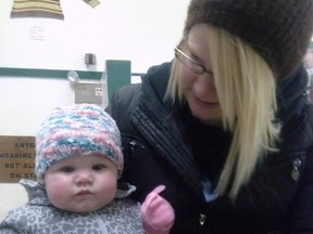 Kristen Hiebert and her daughter Avery are shown in a handout photo. Donations are pouring in to a GoFundMe page for Hiebert, a Manitoba woman who spent a painful and frigidly cold night in a ditch, huddled for warmth with her young daughter after they were thrown from a vehicle in a crash.