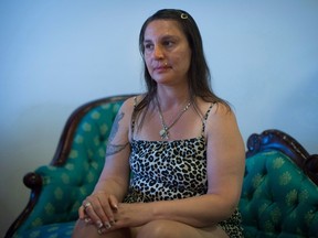 Bobbi O'Shea poses for a photograph at the Pivot Legal Society offices in Vancouver, B.C., on May 29, 2015. Bobbi O'Shea was awarded her $9,000 in general damages after a judge found the City of Vancouver liable for a breach in her standard of care, but found use a restraint device justified. THE CANADIAN PRESS/Darryl Dyck