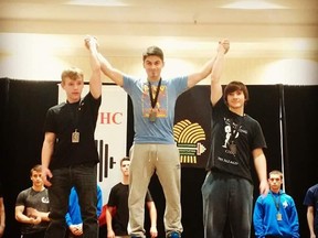 Sudbury's Joel Asselin (right) celebrates his bronze medal win at the Canadian Junior Championships on Jan. 16.