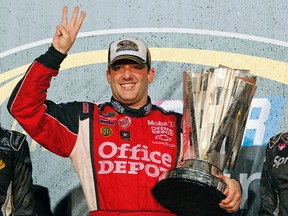 In this Nov. 20, 2011, file photo, Tony Stewart celebrates after winning his third NASCAR Sprint Cup Series championship, at Homestead-Miami Speedway in Homestead, Fla. The three-time NASCAR champion reiterated Thursday, Jan. 21, 2016,  he'll race in other series after this year _ but not the Indianapolis 500, he insisted _ and his decision to leave the Sprint Cup Series is simply about giving himself more free time to pursue everything that's been on hold the last three decades. (AP Photo/Terry Renna, File)