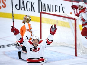 Carolina Hurricanes left wing Jeff Skinner celebrates after his hat trick past Philadelphia Flyers goalie Michal Neuvirth during the third period at Wells Fargo Center in Philadelphia on Dec.15, 2015. (Eric Hartline/USA TODAY Sports)